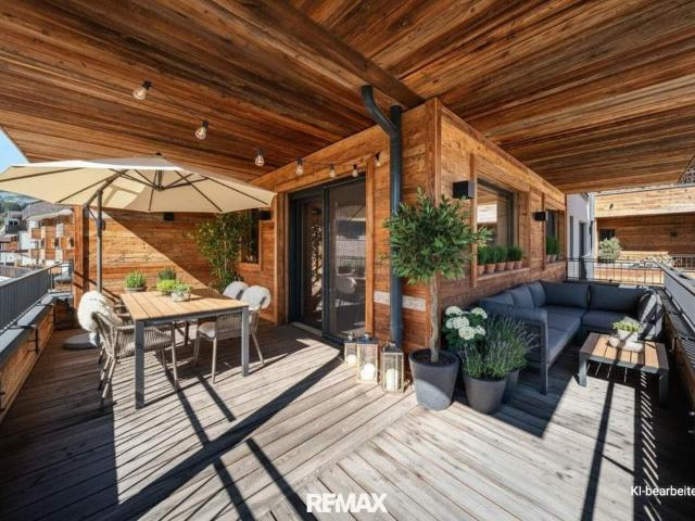 Zentrale Traumlage mit großem Balkon & Kitzbüheler Hornblick