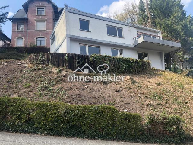 Zeitloser Flachdach Bungalow in bester Citylage – sanierungsbedürftig