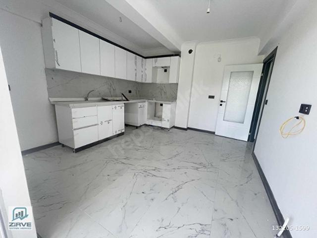 ZİRVE EMLAK'TAN KAPANMAZ CEPHE EBEBEYİN BANYOLU SATILIK DAİRE