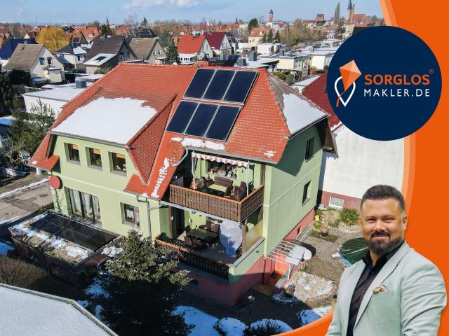 Zweifamilienhaus mit zwei Wohneinheiten und attraktivem Grundstück!
