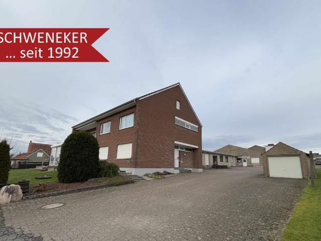 VERKAUFT! Zweifamilienhaus mit Gewerbefläche und Ackerland in Bünde Holsen!