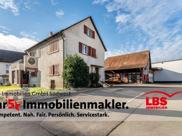 Zweifamilienhaus + Gewerbeflächen + Grundstück! Vielseitiges Anwesen mit Entwicklungspotenzial!