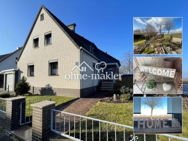 Zuhause in Borsum: Gemütliches Zweifamilienhaus mit Garten