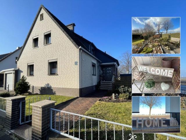 Zuhause in Borsum: Gemütliches Zweifamilienhaus mit Garten