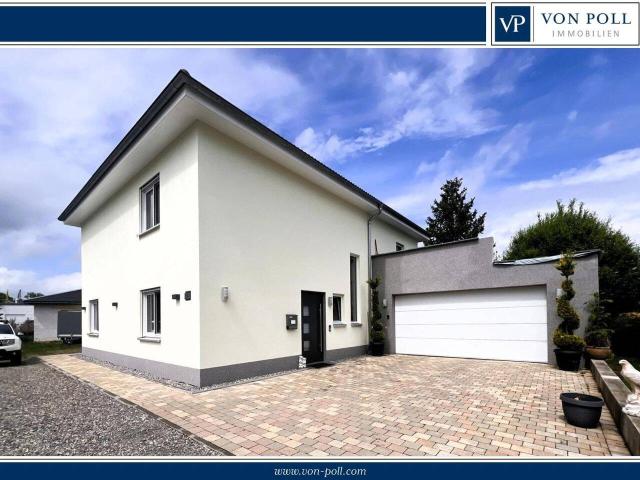 Zukunftssicher wohnen: Einfamilienhaus + ausbaufähiger Bungalow auf großem zentralen Grundstück