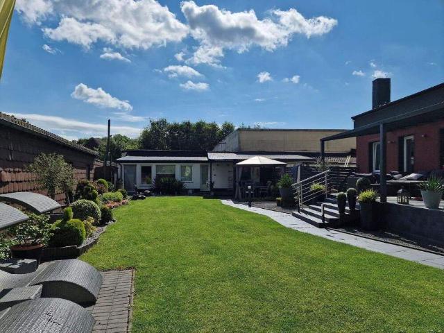 Zukunftssicher investieren wohnen im eigenen Haus und Einkommen generieren