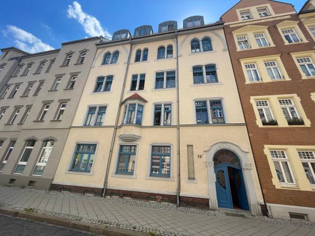 Zuverlässige Kapitalanlage: Vermietete Eigentumswohnung mit Tageslichtbad, Balkon und Gartenanteil in ruhiger Umgebung zu verkaufen