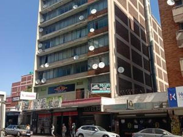a mixed use building for sale
