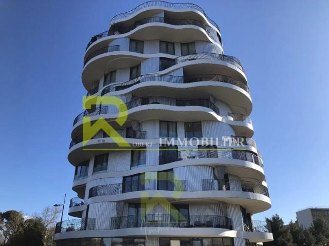À Montpellier, appartement avec terrasse en vente avec R Imm