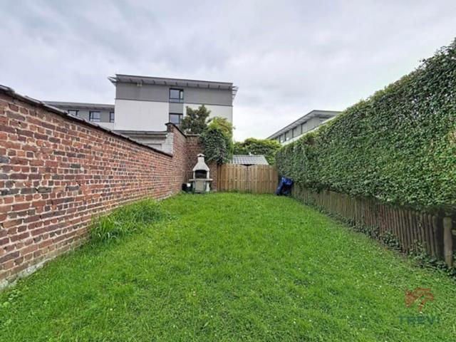 A beautiful 4 bedroom house with a garage and garden