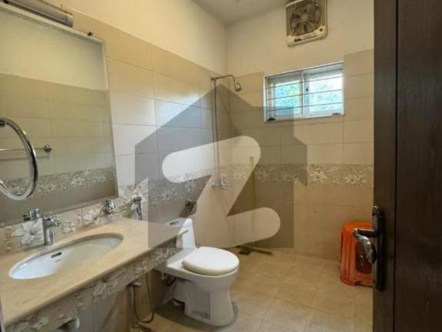 A Beautiful House For Rent In F10 Ideal Location All Tile Flooring Near To Market Close To Double Road Big Parking Front Beautiful Lawn F 10