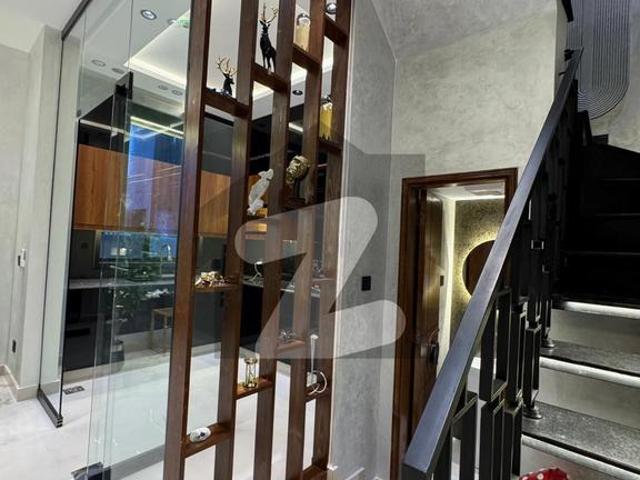 A beautifully designed and impeccably maintained 5 Marla luxury house is available in a prime DHA location, offering the perfect blend of elegance, comfort, and modern living. DHA 9 Town Block A