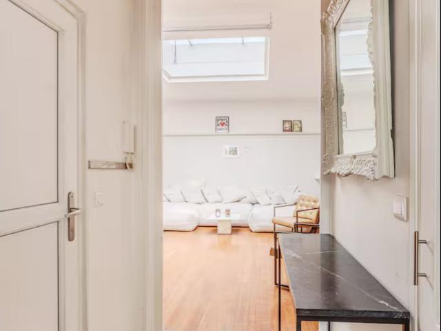 A charming, bright apartment in a courtyard, offering peace and comfort in a pleasant neighborhood in Paris