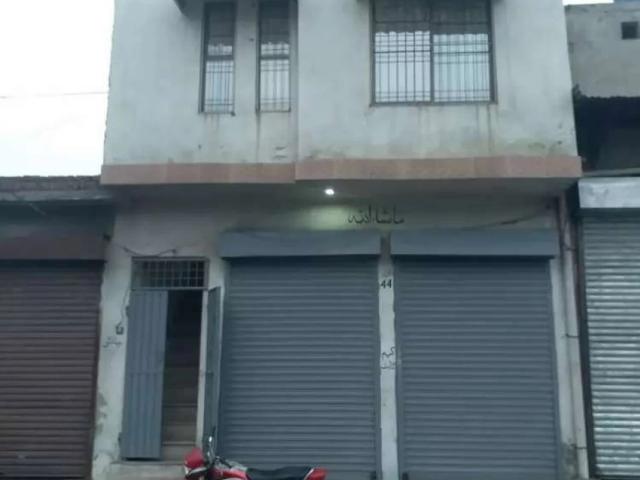 A commercial land for sale bueatifull office+ home Faisalabad ID 48572