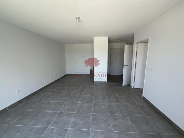 A louer appartement 2 pièces neuf avec terrasse et parking