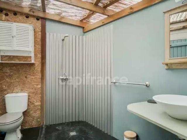 A louer Case Pilote Maisonnette en bois de type Studio