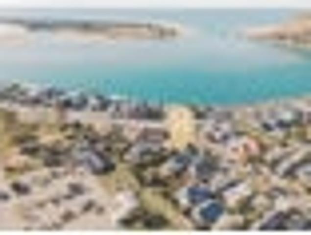A Rare Opportunity To Own a 1/4 Acre Coastal Abode