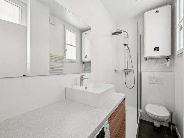 A Refined Parisian Retreat with Private Terrace, Paris Amsterdam Apartments for Rent