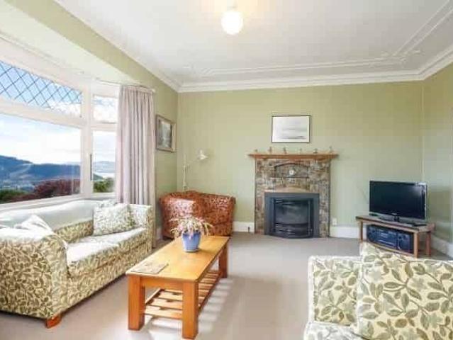 A sunny brick house in Roslyn with fantastic views