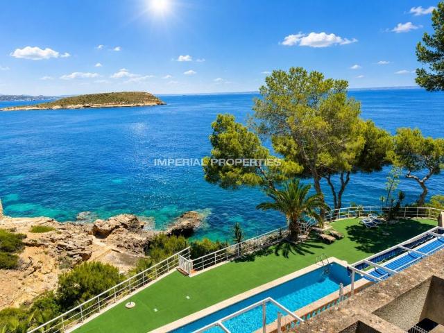 a spacious three bedroom rental apartment in a quiet cala vinyas community of six homes featuring a communal pool and direct sea access