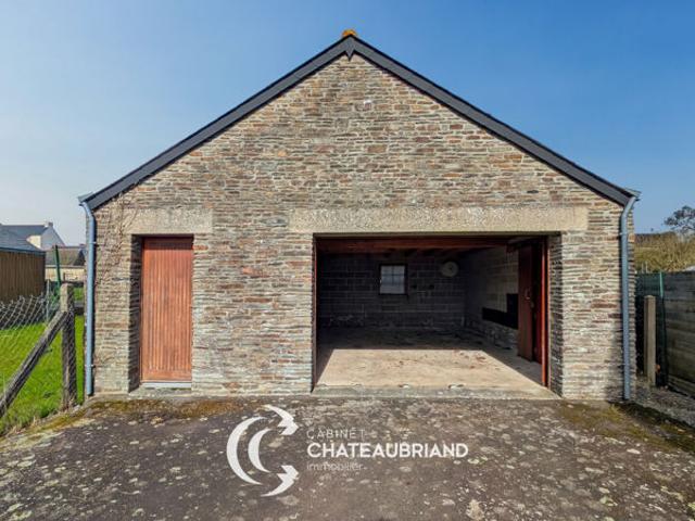 À vendre Terrain avec garage Fort potentiel de construction