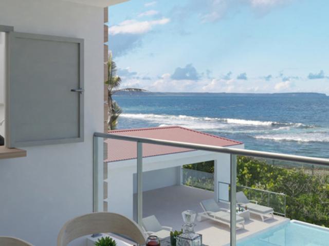 A VENDRE appartement T3 face piscine et face mer en RDC à Moule