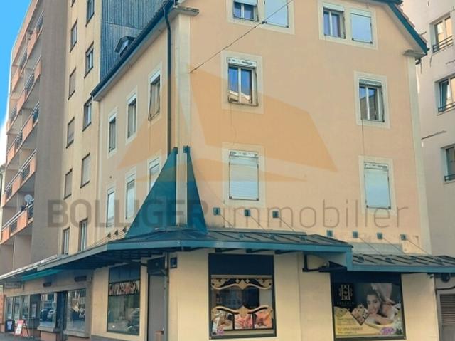A vendre Immeuble mixte + 2 places de parc