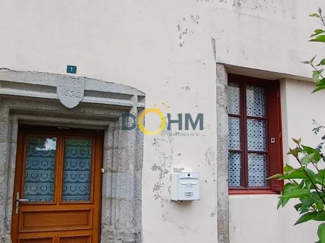A VENDRE MAISON DE BOURG AVEC GARAGE