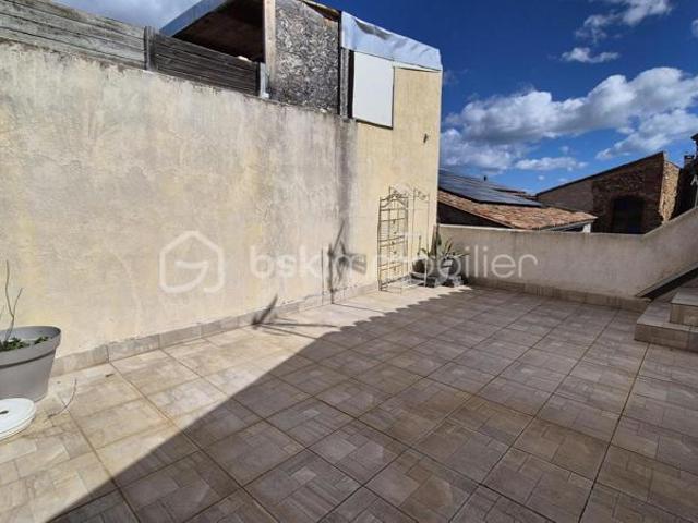 A VENDRE MAISON DE VILLAGE DEUX FACES DE 74M² A PIA CENTRE VILLE PROCHE DE TOUS LES COMMERCES ET DES ECOLES DEUX CHAMBRES TERRASSE PANORAMIQUE CAVE