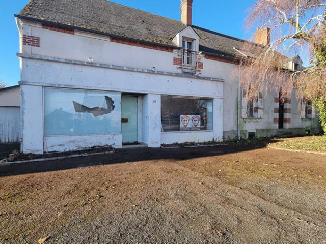 A vendre maison + local commercial + terrain constructible