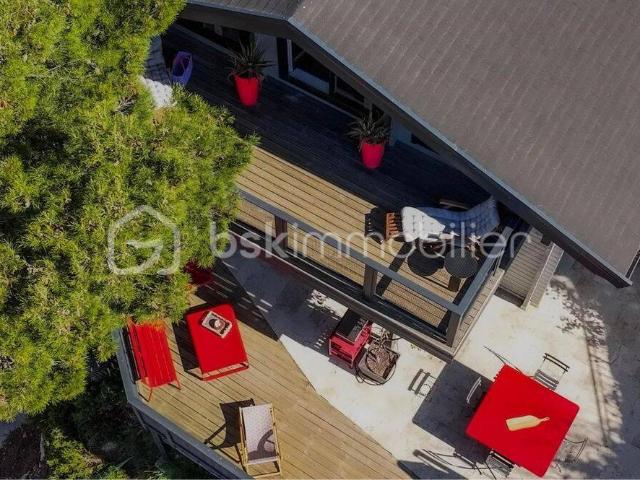 À Vendre: Maison T3 en Bois Moderne Un Écrin de Verdure au Ca
