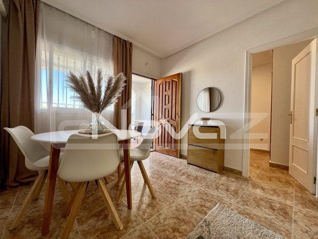 A very cozy apartment in Punta Prima. With underground parking and a swimming po