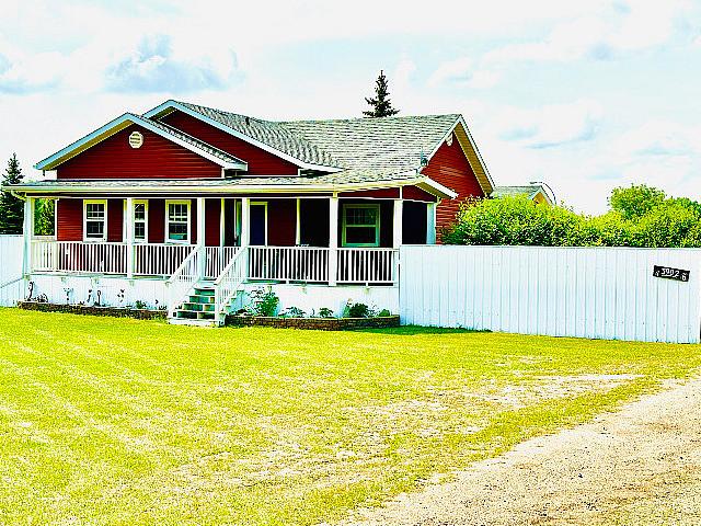 Acreage Living In Town!