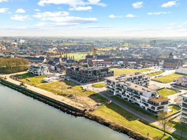 Aan de LEIE: gelijkvloers appartement met 2 SLK en TUIN!