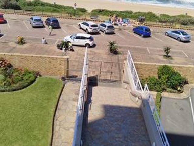 absolutely on the beach. 2 bedroom.