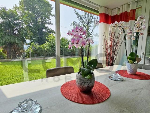 AGNO Moderne 3.5 Zimmer Wohnung mit eigenem Garten