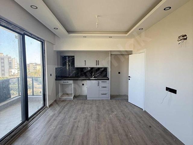 ADLİYE ARKASI ÖNÜ KAPANMAZ ARA KAT 1+1 KİRALIK DAİRE