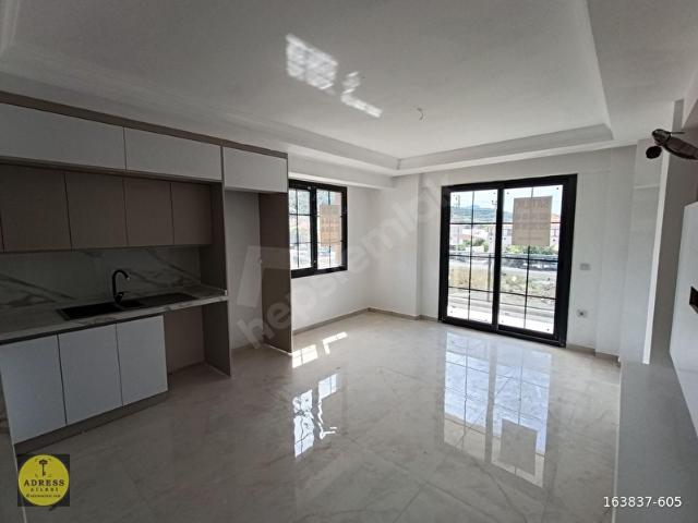 ADRESS AİLESİ`DEN KARABURUN`DA SATILIK 2+1 LÜKS DAİRE