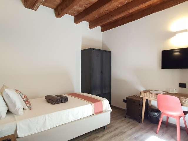 Affittasi ampia camera singola in un Coliving a Brescia