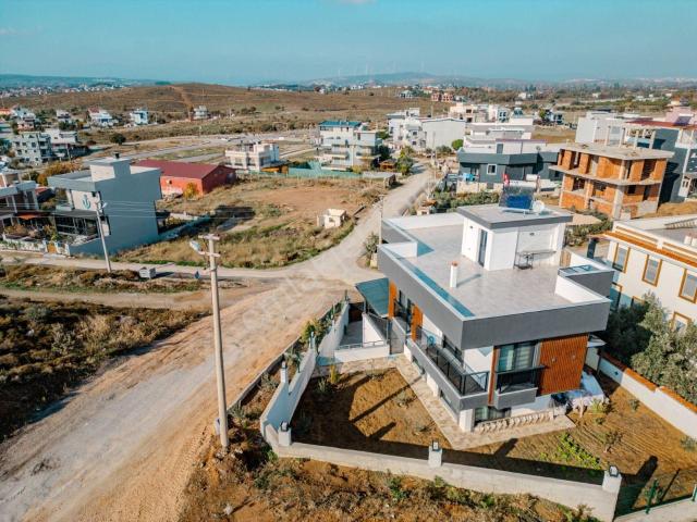 Akarca'da Huzurlu Yaşamı Konforla Buluşturan Özel Tripleks Villa