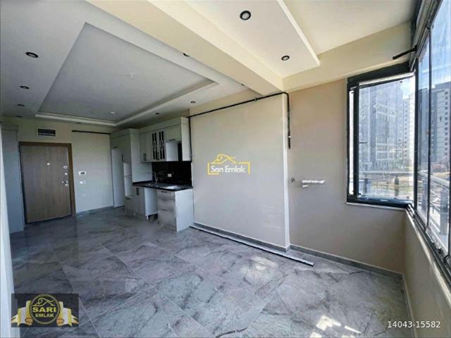 AKDENİZ MAHALLESİ HAVUZLU SİTE İÇİ AÇIK CEPHELİ 1+1 SATILIK DAİRE