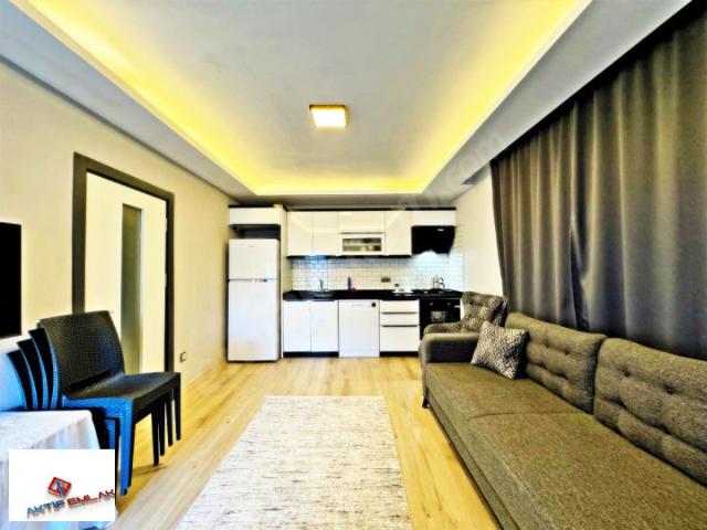 AKTİFTEN AKÇAYDA ÖN CEPHE GENİŞ TERASLI 2 YAŞINDA ŞIK TASARIMLI 2+1 SATILIK DUBLEX
