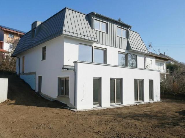 AIGNER Großzügige Neubau Doppelhaushälfte mit Bergblick