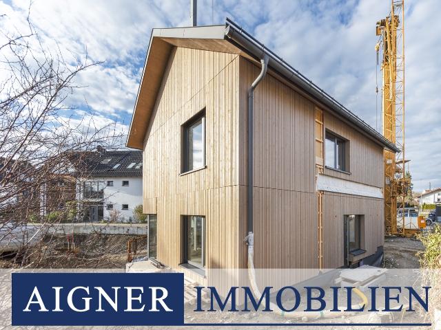 AIGNER Exklusives Architektenhaus: Stilvolles Interieur trifft auf nachhaltiges Wohnen