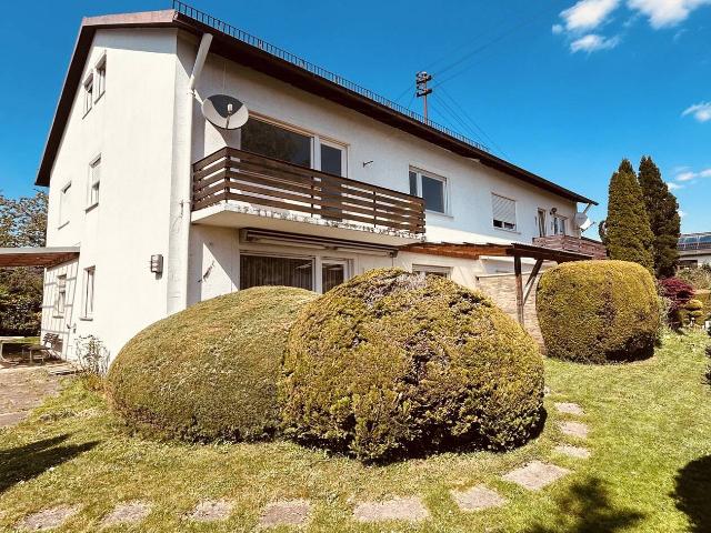 AIGNER Renovierungsbedürftige Doppelhaushälfte in Fürstenfeldbruck mit großzügigem Garten