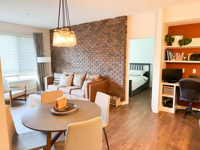 Air Conditioned! Lovely West Facing Main Floor Unit