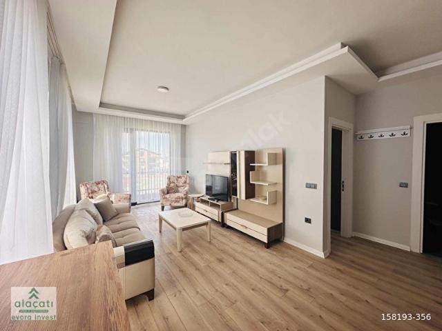 Alaçatıdan tam köşe full artı full eşyalı katta kiralık 1+1