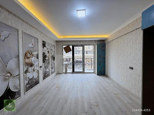 ALAÇATI'DAN YERDEN ISITMALIGENİŞ M2İSKANLI KİRALIK 1+1