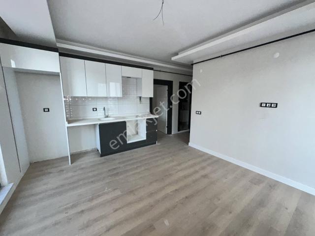 Alan Emlak  Deniz Manzaralı,sıfır, Ara Kat 1+1 Daire
