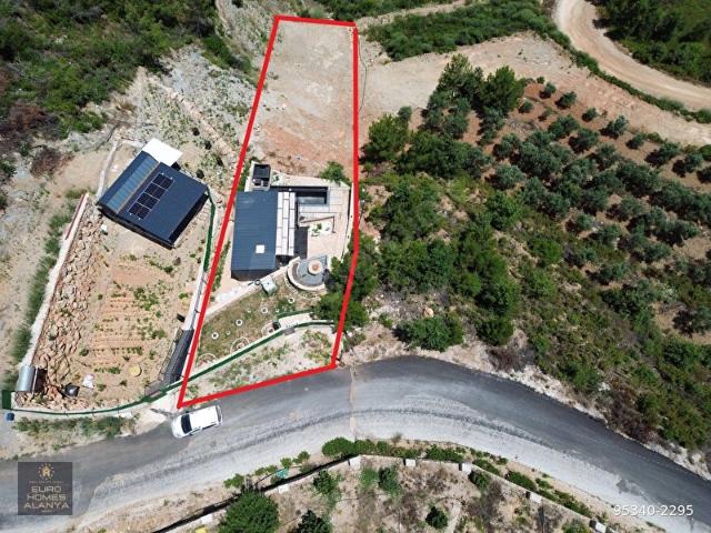 ALANYA DİM ÜZÜMLÜ'DE SATILIK BARAJ MANZARALI 1037M2 EV VE BAHÇE